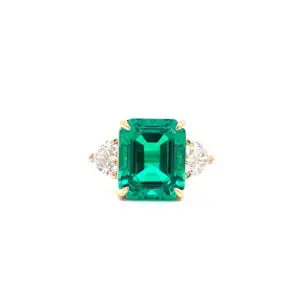 Anillo 14kt Oro Amarillo con Esmeralda y Diamante de Laboratorio